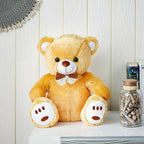 Webby Plush Cute Sitting Teddy Bear Soft Toys With Neck Bow (Brown Color)