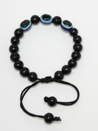 NVR Women & Men Black Evil Eye Rakhi With Roli Chawal - Distacart