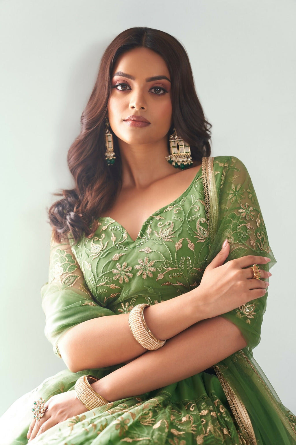 Eilara Elegance Pista Green Net With Embroidered And Thread Zari Sequence Function Wear Lehenga Choli
