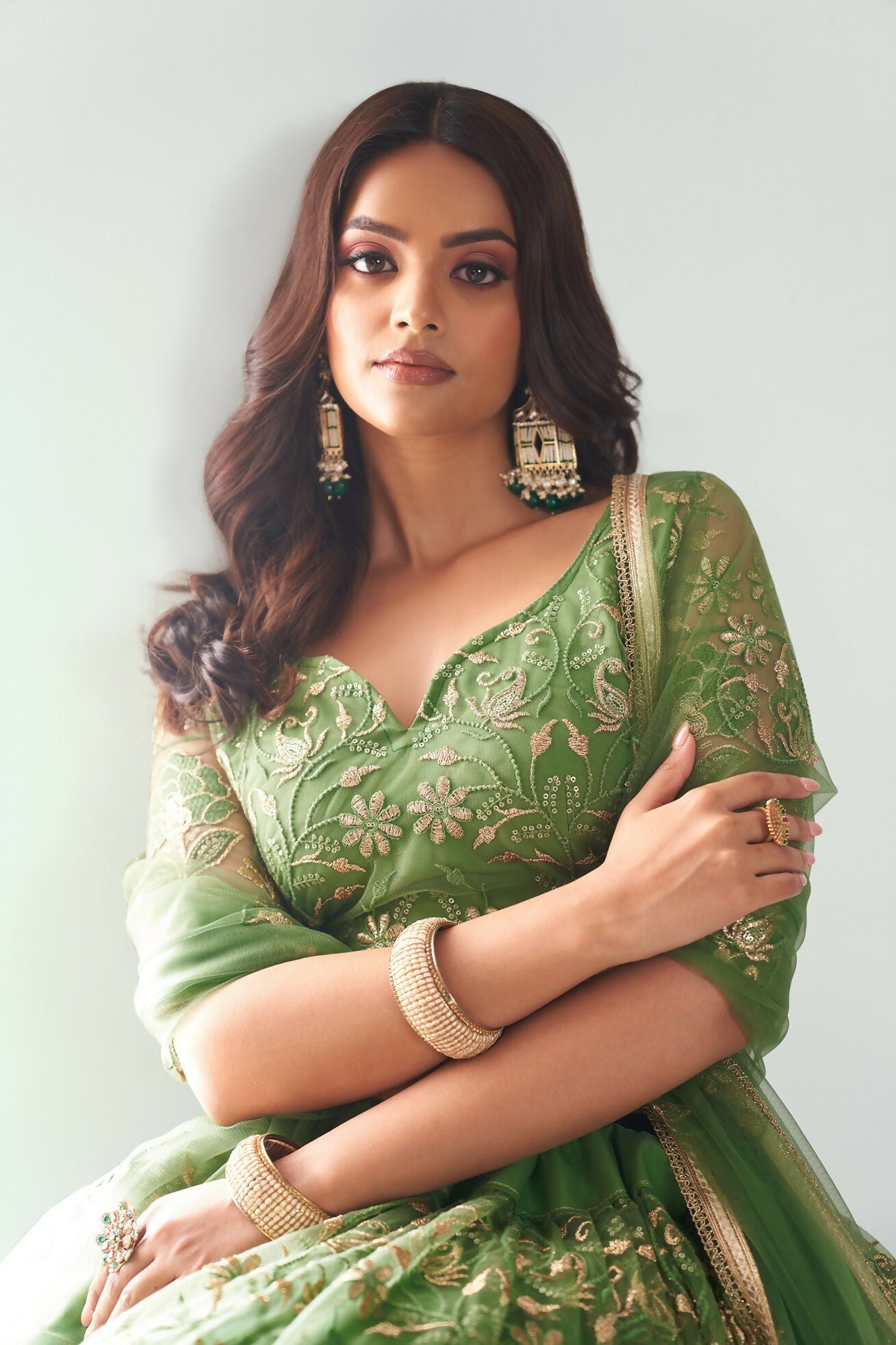 Eilara Elegance Pista Green Net With Embroidered And Thread Zari Sequence Function Wear Lehenga Choli