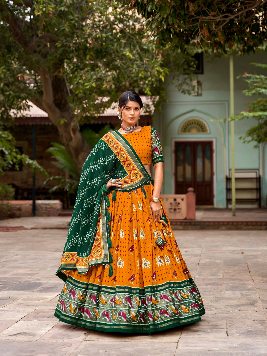 Vastranavya Patola Printed and Foil Work Tussar Silk Lehenga with Unstitched Blouse - Mustard