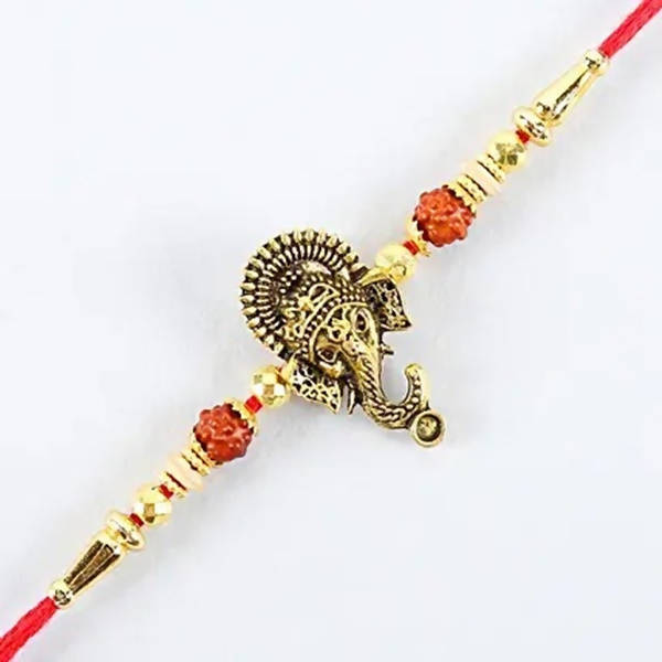 Lord Ganesha Rudraksha Rakhi & Kaju Roll Box - Distacart