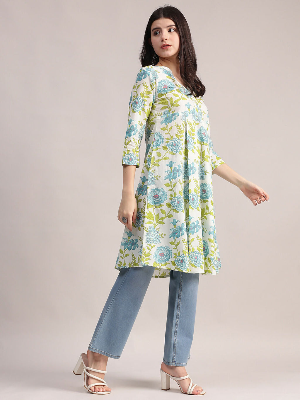 Aavyora Women's Off-White and Blue Cotton A-Line Tunic with Blue and Green Floral Print.