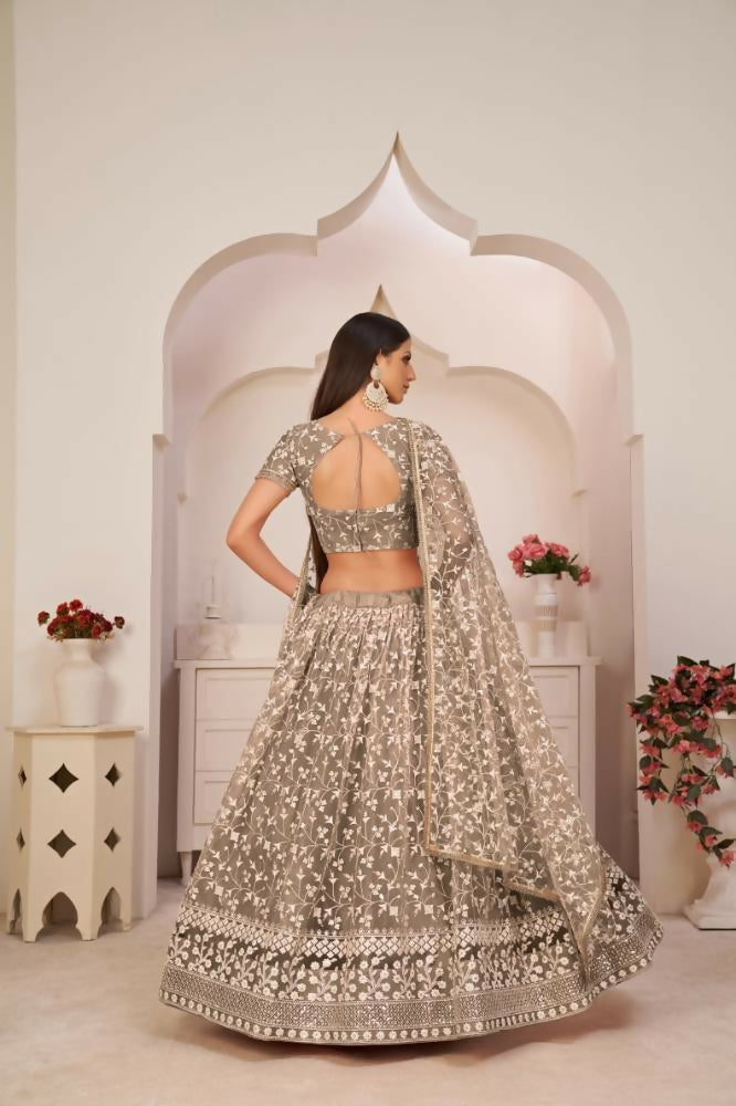 Aastha Fashion Chocolate Brown Butterfly Net White Cotton Thread Work, Zari Work And Sandwich Sequence Work Embroidery Wedding Wear Lehenga Choli