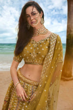 House of Panchhi Mustard Bridel Net Sequins, Moti, Mirror And Thread Embroidery Lehenga Choli & Dupatta