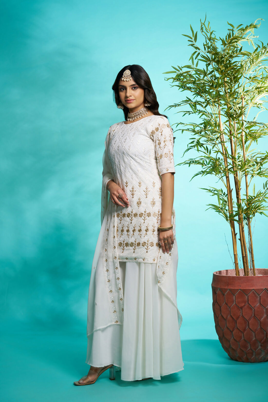 Aayaa Designer Faux Gorgette Embroidery Zari Sequins Thread work Full Flaired plazzo Suit with Dupatta - Off White