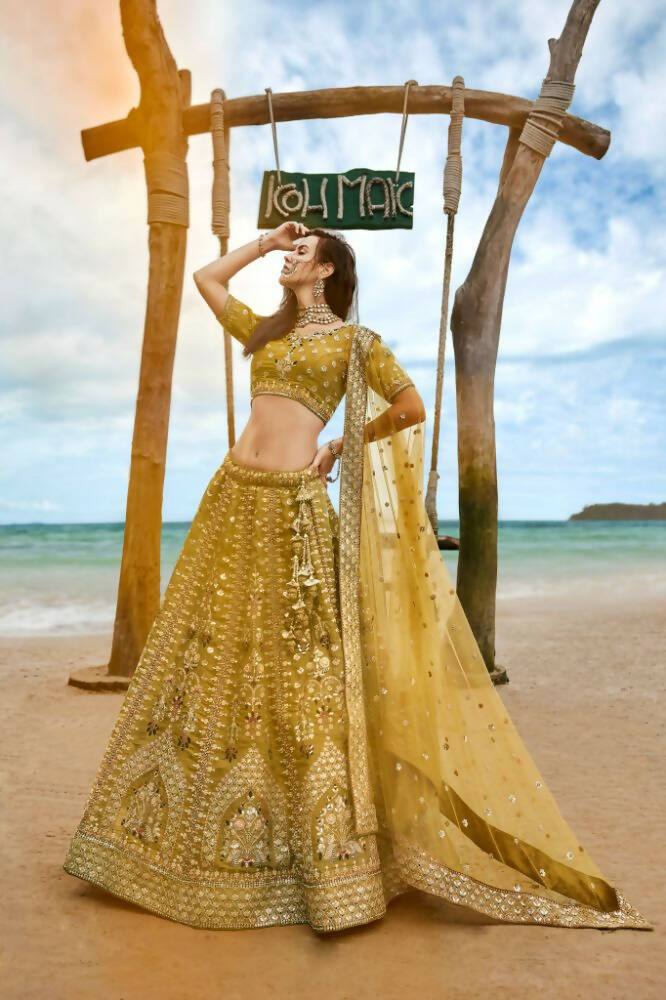House of Panchhi Mustard Bridel Net Sequins, Moti, Mirror And Thread Embroidery Lehenga Choli & Dupatta