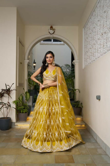 Aastha Fashion Mustard Yellow Butterfly Net White Cotton Thread Work And Sequence Work Embroidery Wedding Wear Lehenga Choli
