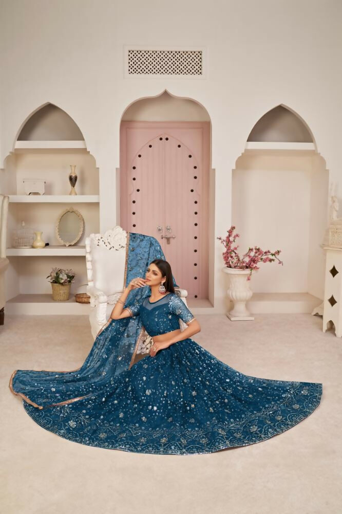 Aastha Fashion More Peach Butterfly Net All Over Thread Work, Zari Work And Sandwich Sequence Work Embroidery Wedding Wear Lehenga Choli
