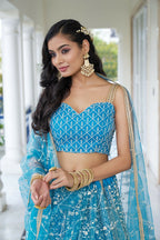 Eilara Glamorous Sky Blue Butterfly Net With Thread And Sequence Embroidered Work Lehenga Choli For Wedding