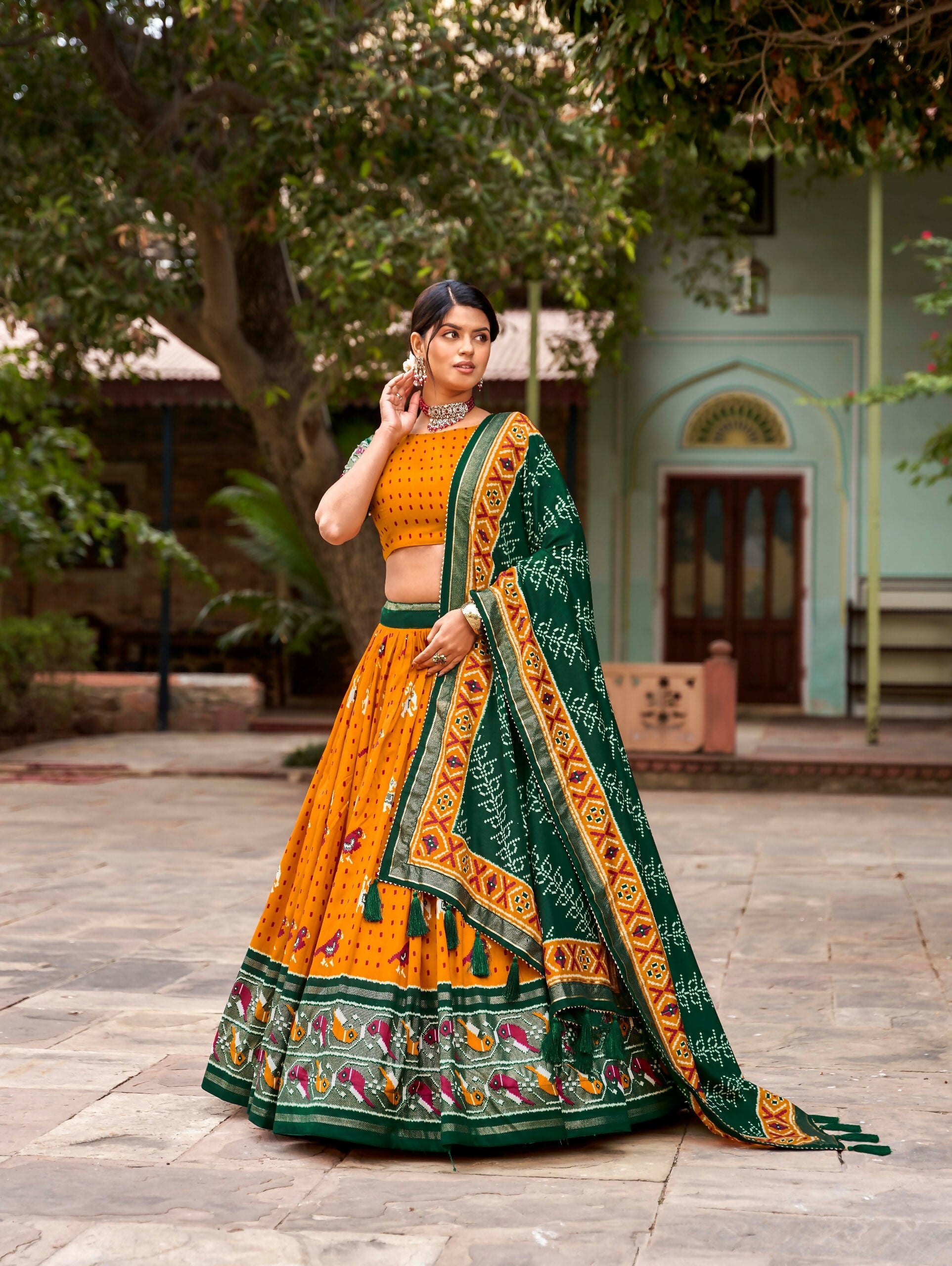 Vastranavya Patola Printed and Foil Work Tussar Silk Lehenga with Unstitched Blouse - Mustard