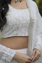 Vastranavya Faux Georgette With Sequins & Thread Embroidered Work Lehenga Choli - White